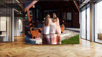 Two girls in plaid at autumn morning Wall mural