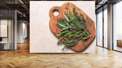 Cutting board with  edible herbs. Thyme, Oregano, Rosemary, Sage. Wall mural