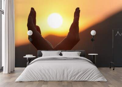 Sunset in hands Wall mural