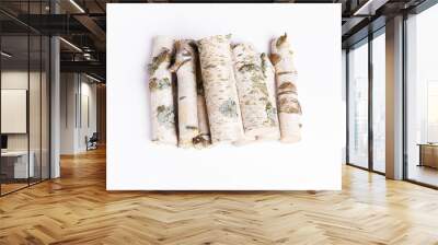 A pile of birch firewood on white background Wall mural