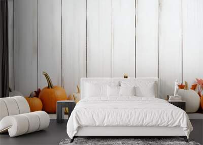 White and orange pumpkins of different shapes and sizes on a white planks, Halloween Wall mural