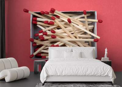 a box of matches on red background Wall mural