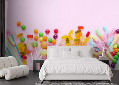 colorful candy and fruit jelly jujube on a pink background Wall mural