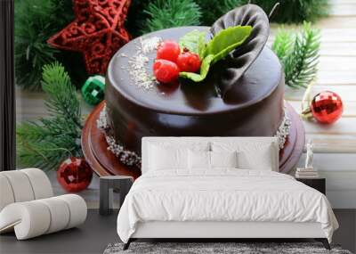 delicious christmas chocolate cake on festive table Wall mural