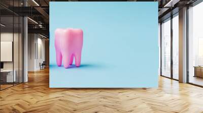 Two pink and blue teeth on a blue background. Dental health concept. Flat lay, top view, copy space for text. Stomatology. Place for text. Oral health and dental inspection teeth. Dentistry. Wall mural