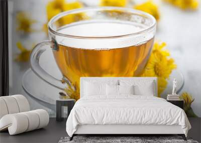 herbal tea with coltsfoot flowers Wall mural