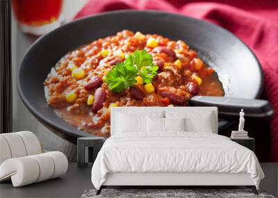 mexican chili con carne in black plate Wall mural