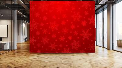 Christmas illustration with various small snowflakes on gradient background in red colors Wall mural