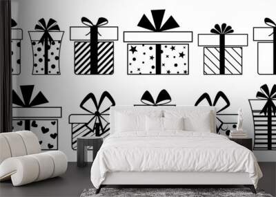 Set of gift boxes with bows and different patterns, in black colors, isolated on white background Wall mural