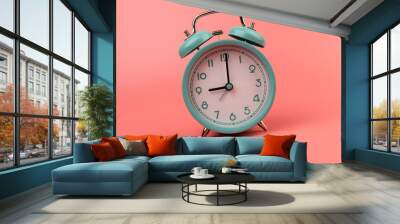 Old clock isolated on a pink background with space for text. Concept of time Wall mural