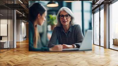 Portrait photograph of a senior woman as a consultant Wall mural