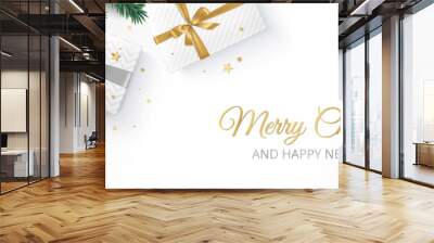 Christmas banner with decorated fir tree branches and presents. Gift boxes with golden and silver ribbons. Merry Christmas text. For New Year and winter holiday cards, headers, gift certificates. Wall mural