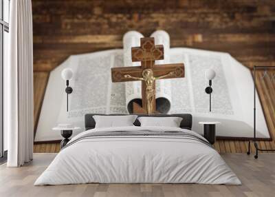 Wooden cross on the background of the Bible. Prayer. Wall mural