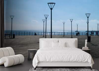 Sea pier with sreet lamps Wall mural