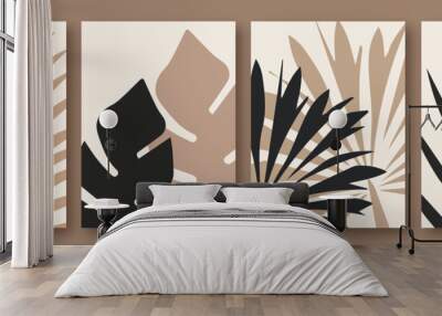 Set of trendy trendy abstract posters, art with plants. Silhouettes of tropical branches and leaves in natural neutral nude colors. Boho style.  Wall mural