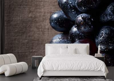 A bunch of black grapes close up Wall mural