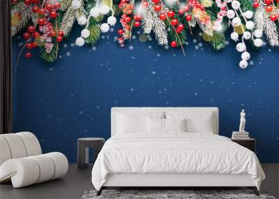 Christmas banner with fir branches and white and red decorations on blue background with snow. Wall mural