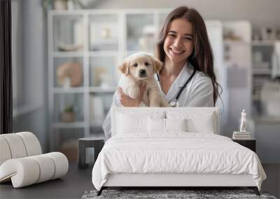 Young female veterinarian holding a puppy in a modern veterinary clinic. Pet healthcare and medical treatment concept. Wall mural