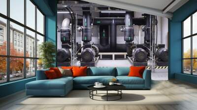 Large industrial water treatment and boiler room. Black pipes, pumps and valves. Space heating Wall mural