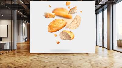 Classic white wheat bread flying on gray background. Round whole and pieces crispy fresh bread, healthy organic food, traditional pastries, bakery. Creative food concept for advertising, design Wall mural