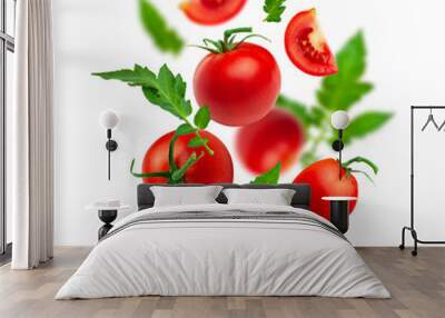 Flying cut out red ripe juicy tomatoes and green leaves isolated on white background. With clipping path. Healthy vegan organic food, vegetable, cherry tomatoes. Creative food concept. Tomatoes patter Wall mural