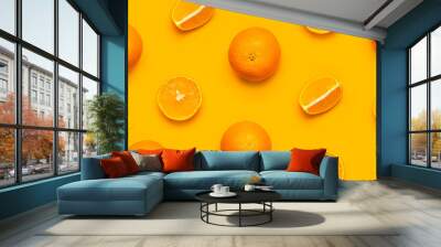 Fresh juicy whole and sliced orange on bright yellow background. Fruit pattern, creative summer concept. Flat lay Top view. Minimalistic background with citrus fruits, vitamin C. Pop art design Banner Wall mural