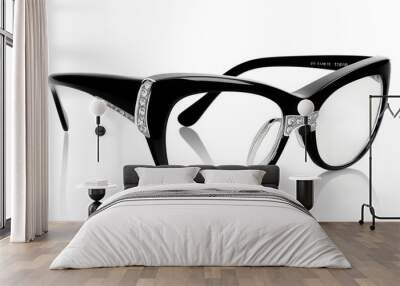 A pair of black cat eye glasses with a diamond frame. The frame is made of gold and silver Wall mural