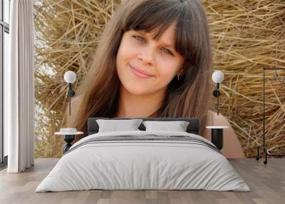 Portrait of a beautiful girl with long hair Wall mural