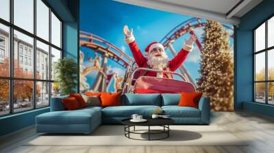 A man dressed as Santa Claus riding a roller coaster at a theme park Wall mural