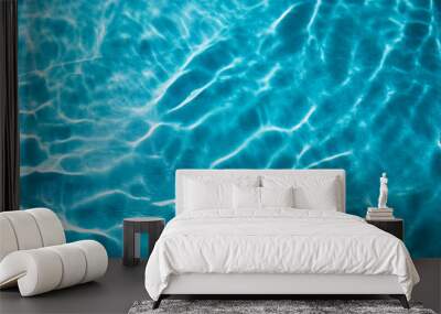 Abstract nature textured background, water waves in the pool with sun reflection, clear blue water Wall mural