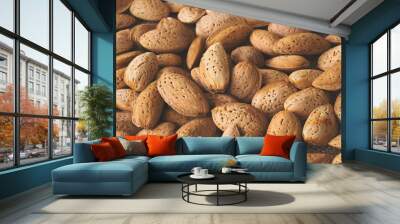 Almond nut in shell as food background. Organic raw almond for vegans Wall mural