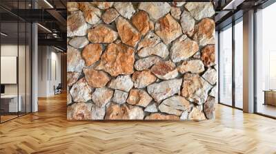 Background of stone  texture. Wall made of natural stones of different sizes Wall mural