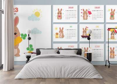 Calendar 2023 template with cute rabbit. Design of calendar with a symbol of the new year. Set of 12 Months calendars. The week starts on Sunday Wall mural