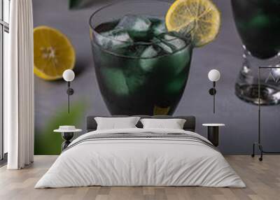 Glasses with green algae mocktail and ice Wall mural