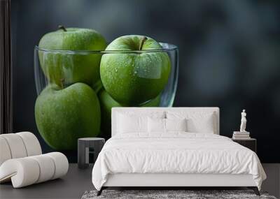 green apple fruit in clear glass cup Wall mural