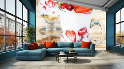 Strawberry yogurt dessert on a rustic table Wall mural