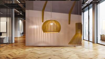 Suspended wooden lamp. Modern chandelier of wood in Scandinavian style Wall mural