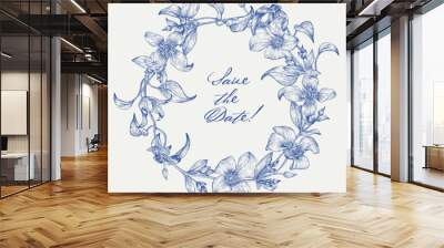 Toile art Vector vintage floral round wreath in blue and light beige. Delicate Clematis flowers and leaves engraved elements. Hand drawn illustration for design greeting card, wedding decor Wall mural