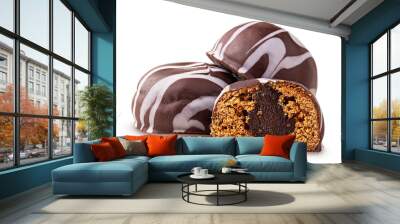 Two chocolate candies one cut in half Wall mural