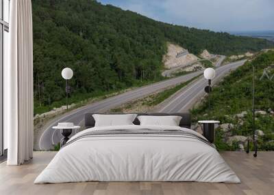 Aerial top vew of winding road in the mountains, drone shot. Altai Krai, Western Siberia, Russia. Road to Resort town Belokurikha 2 Wall mural