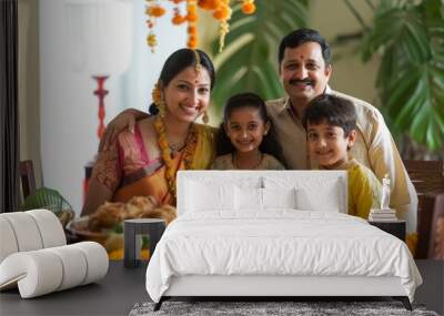 Photo of Indian happy family sits at a festive table with food Wall mural