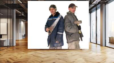 Two bad unskilled builder workers in bad dirty tattered uniform with bad tools. Concept of unskilled workers or crooks or poor quality workers Wall mural