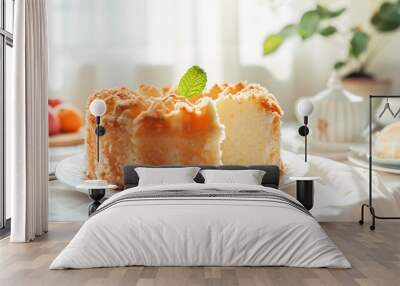 Delicious home baked Angel food cake garnished with fresh mint on white plate. Classic American cuisine pastry Wall mural