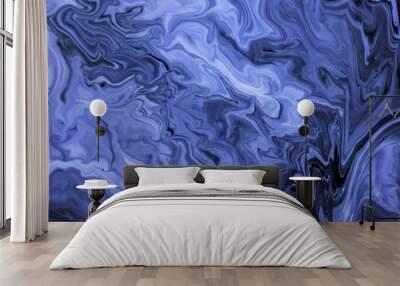 Abstract artistic texture. Acrylic paint and liquid inks are mixed in the water. Color and its transitions create an interesting structure. The blue, violet and white paint freely mix. The effect of n Wall mural