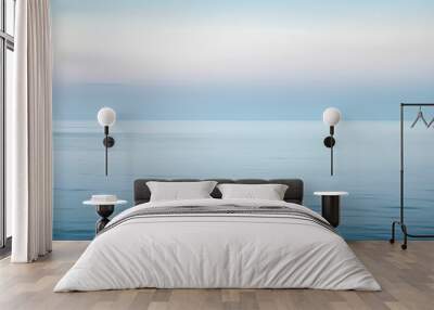 Minimalist ocean horizon in serene blue tones Wall mural