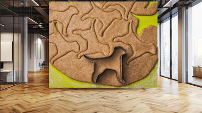 Making homemade dog treats in the shape of a bone. Wall mural