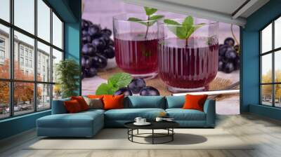 Two glasses of fresh grape juice. Close-up.
 Wall mural