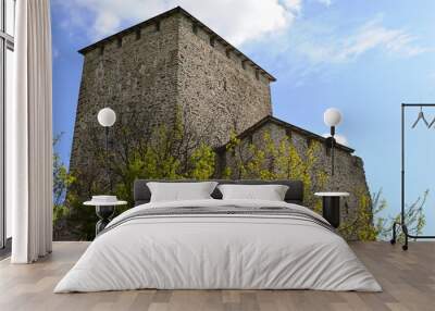 an old stone fort on a hill Wall mural