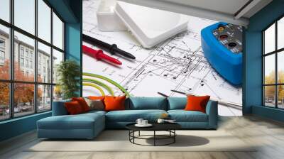 Electrical instruments laying on blueprint Wall mural