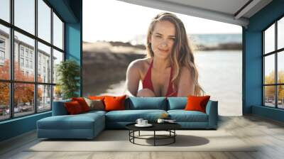 portrait of  a young beautiful woman on a beach Wall mural